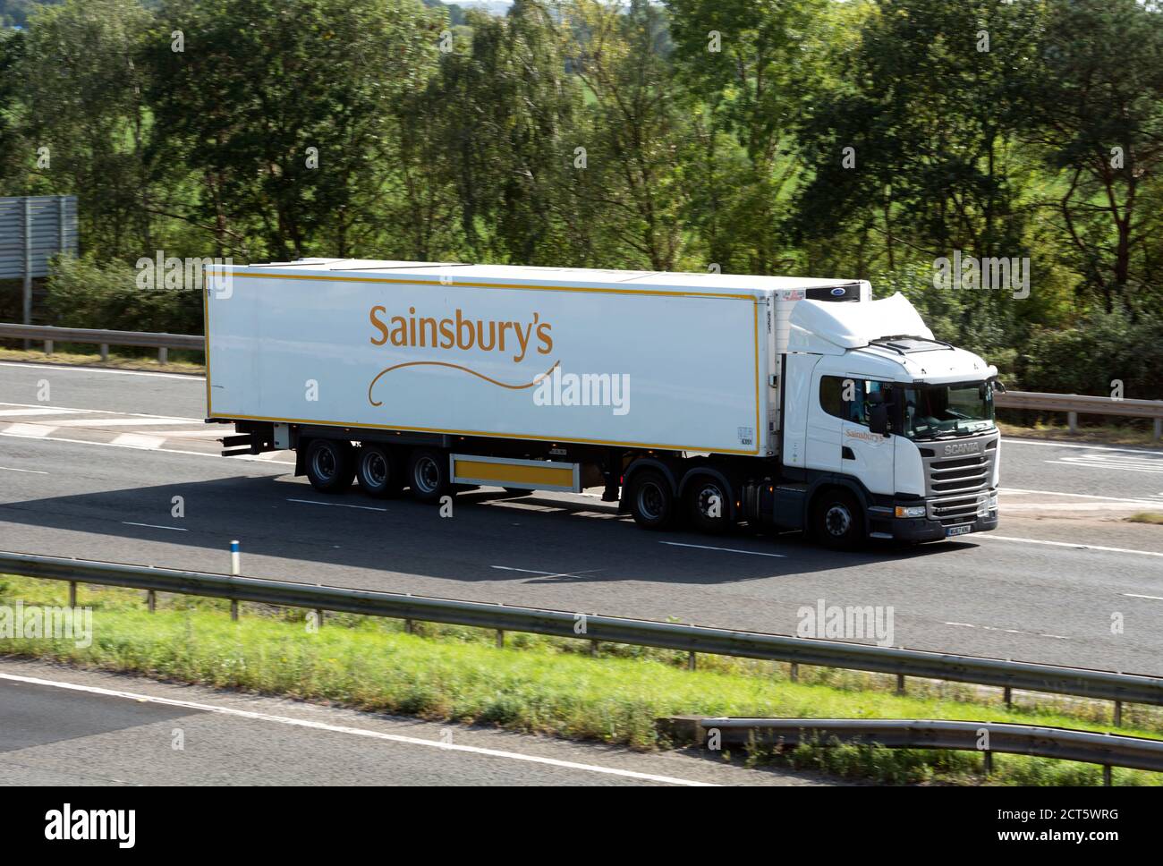 Sainsbury`s articulated lorry on the M40 motorway, Warwickshire, UK Stock Photo